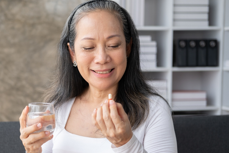 woman-taking-medication